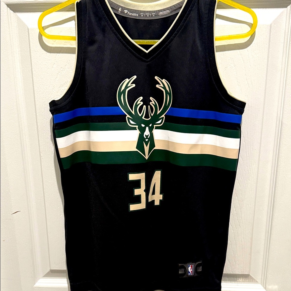 Fanatics Black Jersey with Green, Blue, and White Stripes. Milwaukee Bucks Y Med